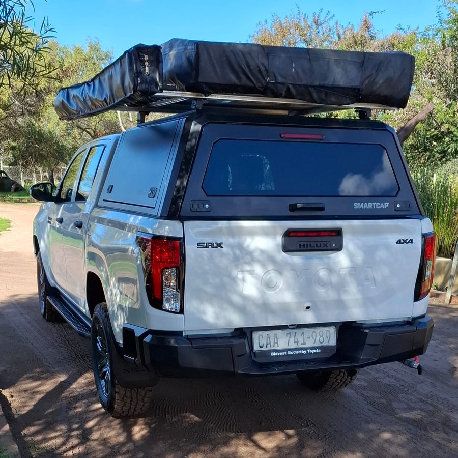 Toyota Hilux 2.8 GD6 SRX - rear view with camping setup